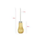 Wooden handle awl set with pointed tip on leather workspace