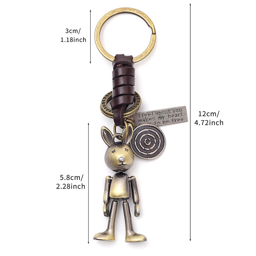 Handmade rabbit leather keychain with punk details, antique finish, and inspirational engraved message.